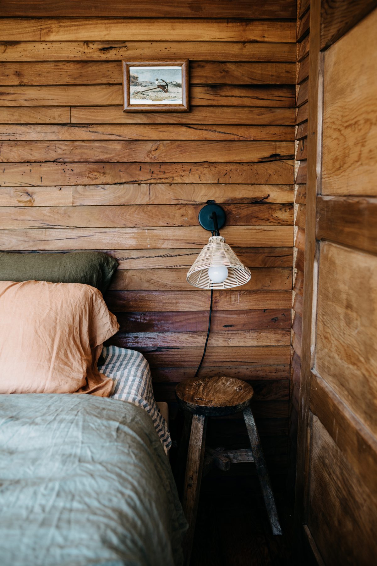 Cosy bed and reading lamp inside the carriage