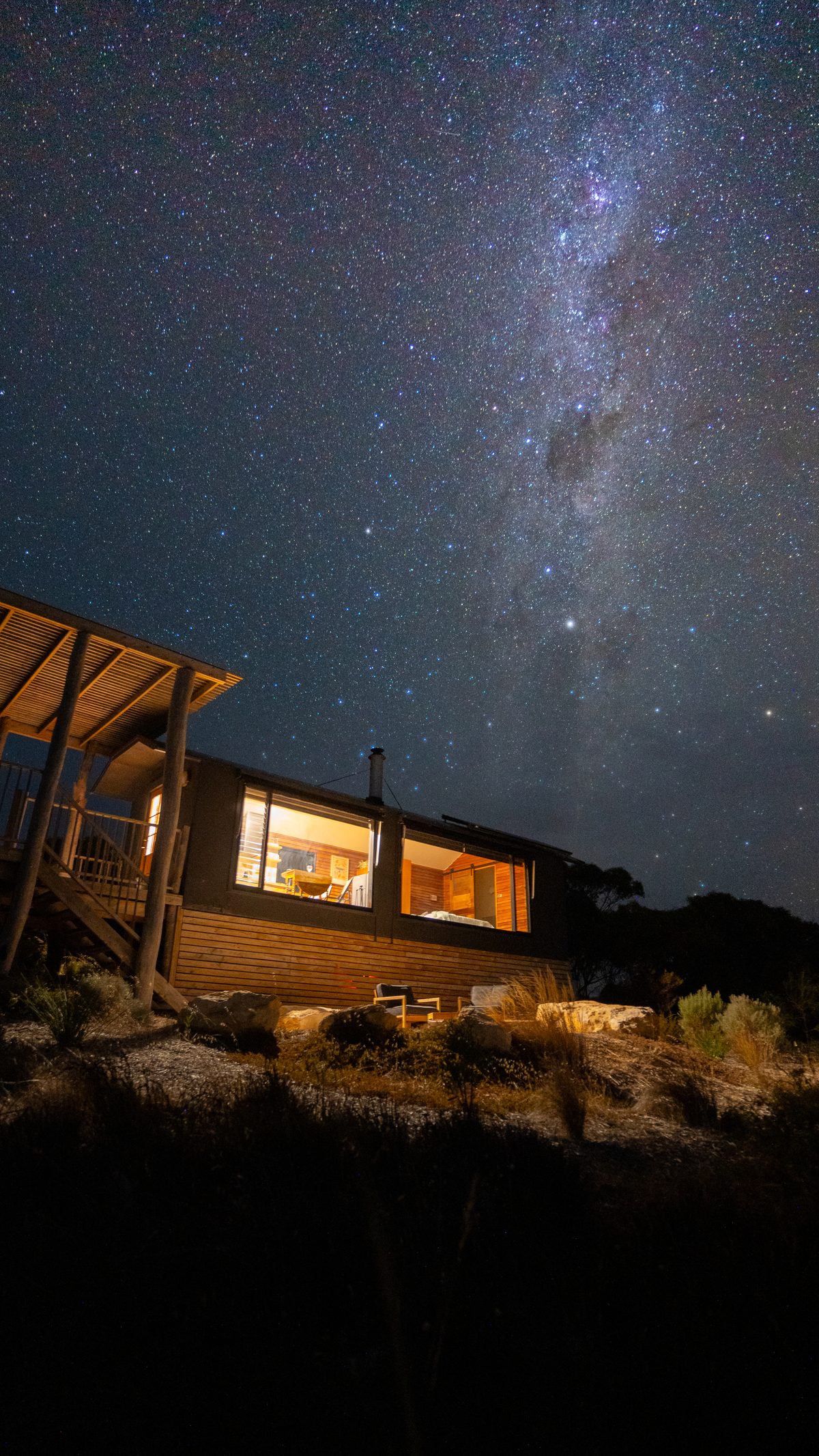 The Greenly Carriage lit up under the stars at night
